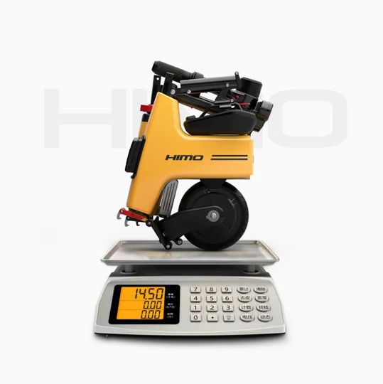 folded HIMO H1 on a weighing scale